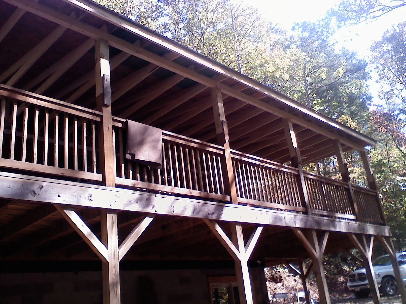 Timber framing under a new elevated porch and deck — Roof Leak Repair in Haltom City by Roofing Brothers